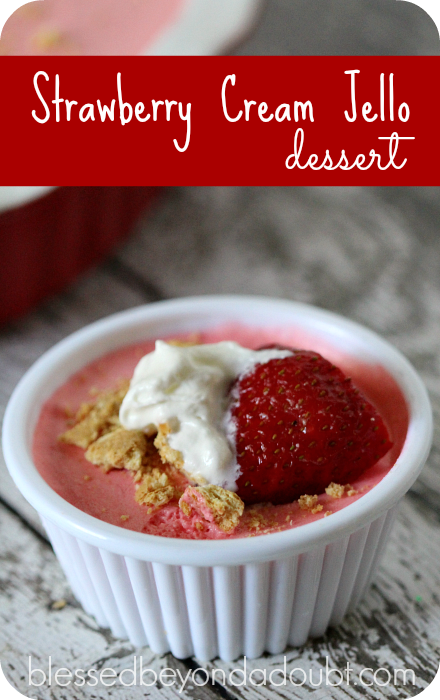 Super easy strawberry jello cream dessert. Make this and you will score. It's so fluffy and light!