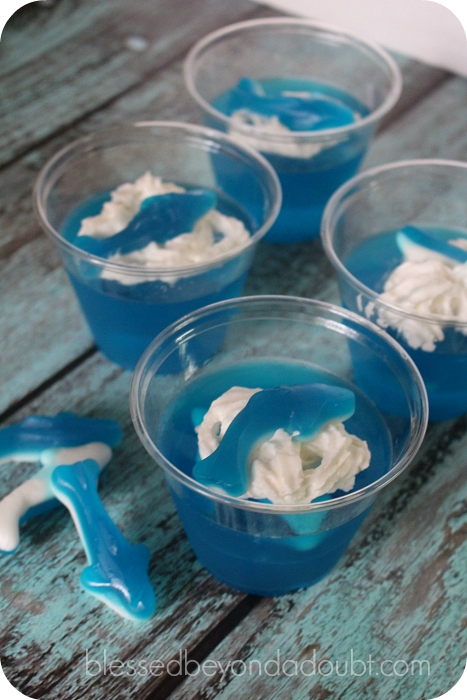 Super easy and fun shark jello treat in honor of Shark's Week. My kids thought these shark treats were the coolest.