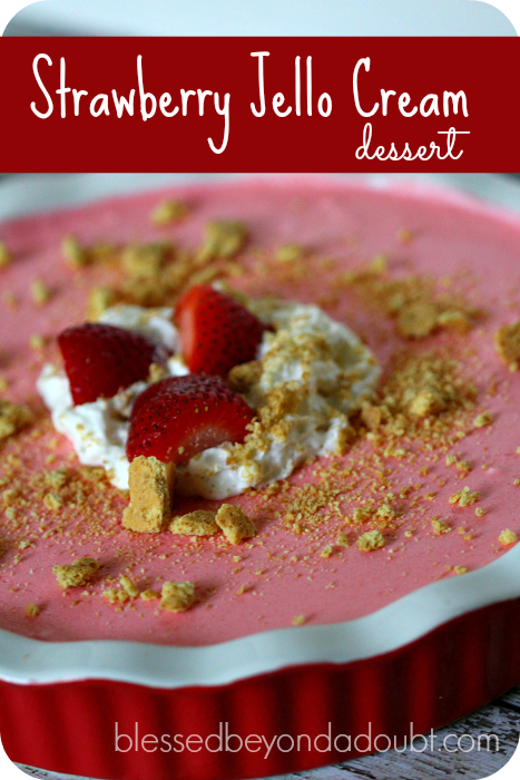 Super easy strawberry jello cream dessert. Make this and you will score. It's so fluffy and light!
